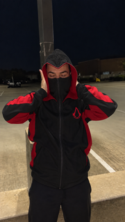 Assassin's Creed black and red hoodie on model