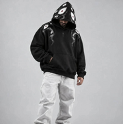 Eyes in the Dark black hoodie — front model view