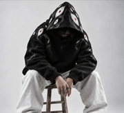 Eyes in the Dark hoodie — hood detail seated view